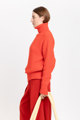 Red alpaca turtleneck sweater